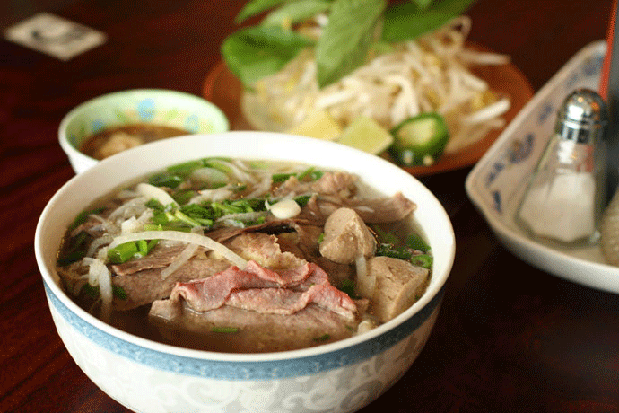 a-bowl-of-pho-vietnam-with-bone-broth-stew-with-noodles-vegetables-and-meats-extremely-eye-catching