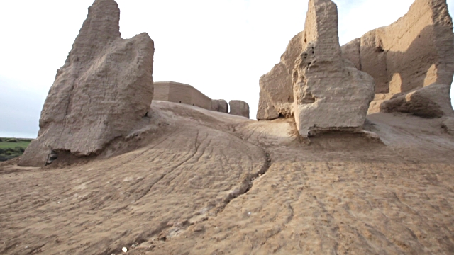 Ancient Merv was a major oasis-city in Central Asia, on the historical Silk Road, located near today's Mary in Turkmenistan. The Little Kyz Kala stands a couple of hundred metres due south: it is roughly square in plan, with sides 20m long, and is more poorly preserved than its neighbour, though does retain the remnants of a stairway in its southeast corner.